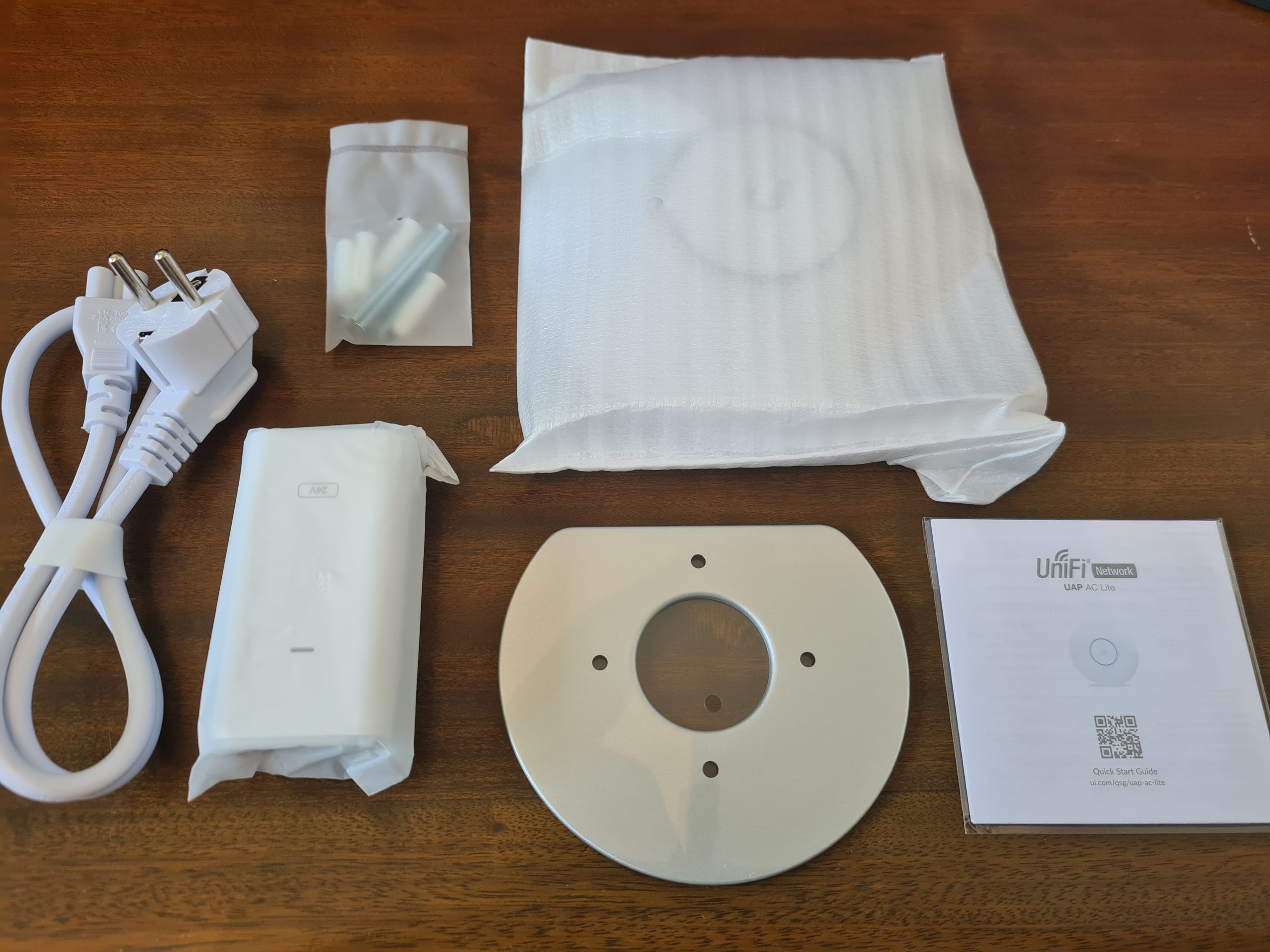 UniFi AP-AC-Lite WiFi Access Point Box Contents - Contrado Digital